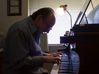 Frank Collett  Pianist Frank Collett on Bill's harmonies and compositions. Collett passed away in 2016 just after the film was released